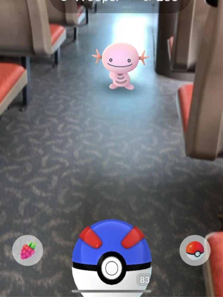Pokemon Go, Go, Going: Why This Mobile Game Is Still Popular with Silvers Seven Years Later - Playing on bus