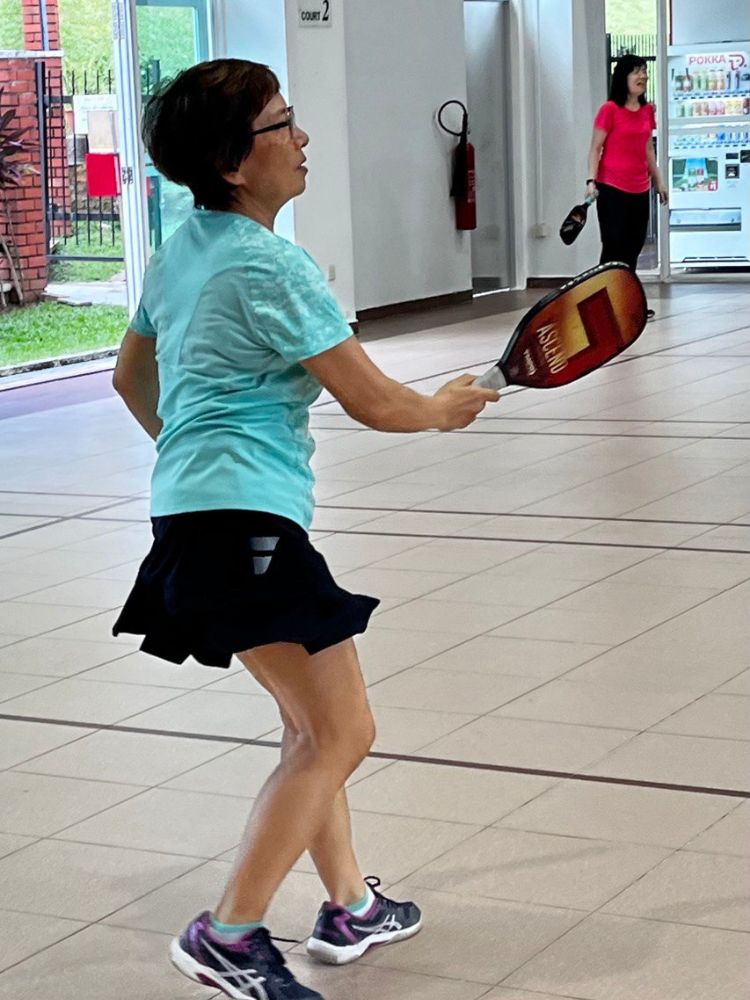 Improve Family Bonding By Playing Pickleball - Florence (in red) with Lee Lu
