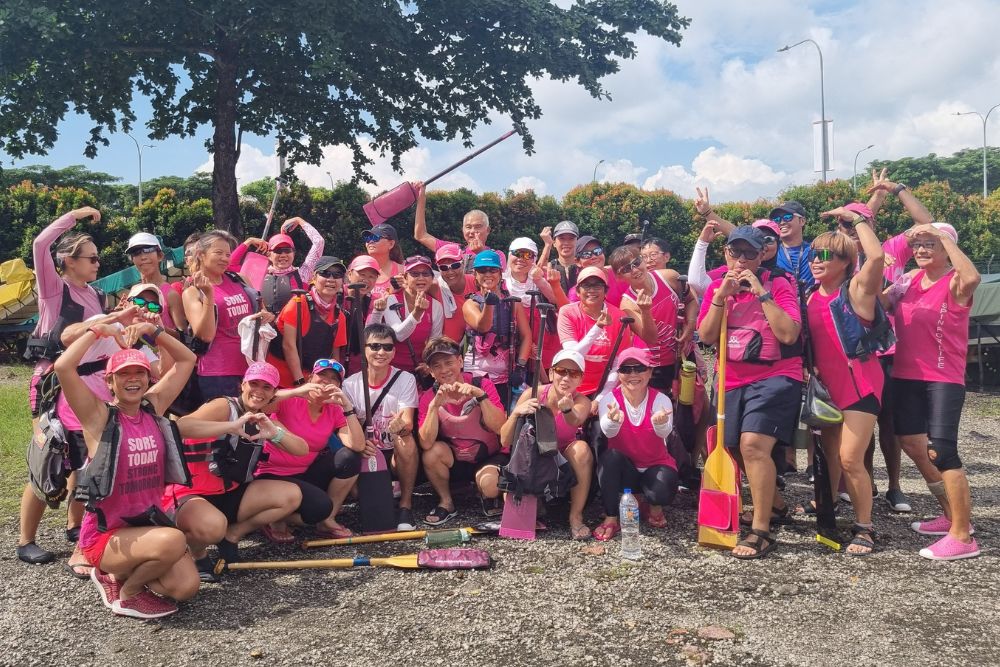 'Mothers, Survivors, Paddlers': The BCF Paddlers In The Pink Dragon Boating Team Row For Hope - Silver streaks in the pink