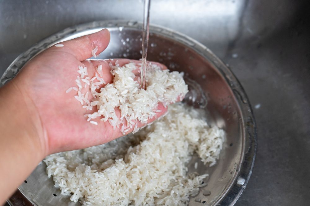 5 Unconventional Water-Saving Tips To Stem The Tide Of Rising Bills - Washing Rice