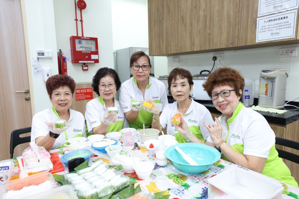 Silver Guardians: Volunteers Take On Helping Fellow Seniors With New AIC Programme, But Crave For More - Making Kueh