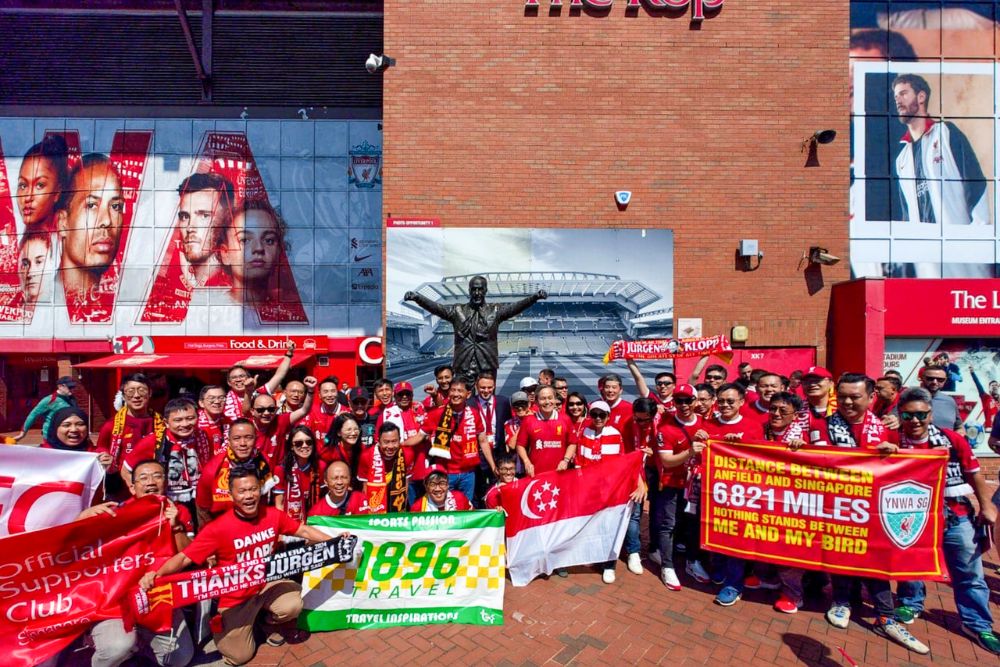 The Enduring Charm Of The EPL: A Senior Football Fan's Tribute To The Beautiful Game And Its Evolution - Singaporean Liverpool fans outside Anfield