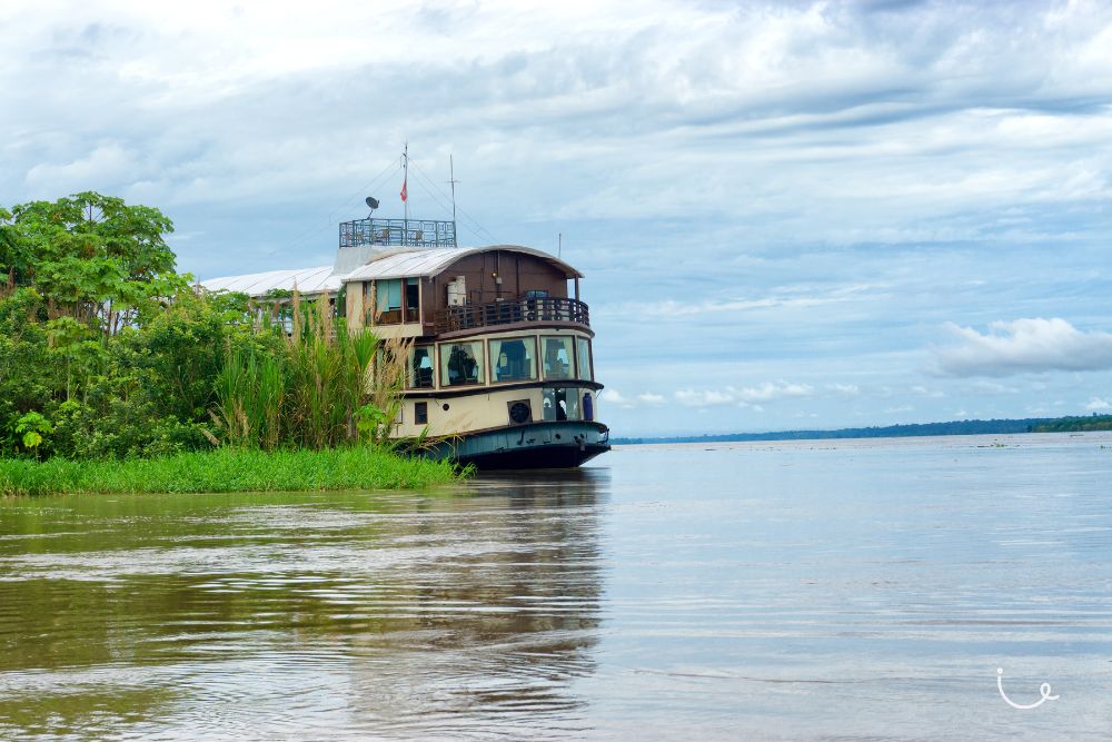 8 Realistic Bucket List Trips That Everyone Can Complete (And Afford!) - Going on a river cruise along the Amazon River