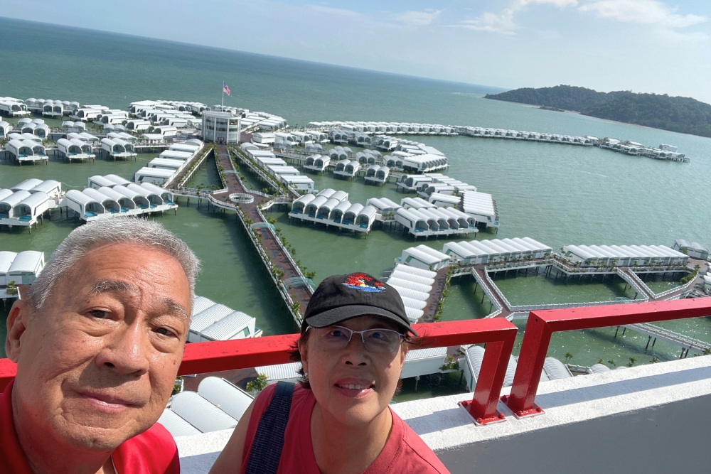 Port Dickson: A Budget Dream Beach Escape With Villas Over The Ocean, Just 4 Hours From Singapore - Overwater chalets in the shape of a hibiscus.