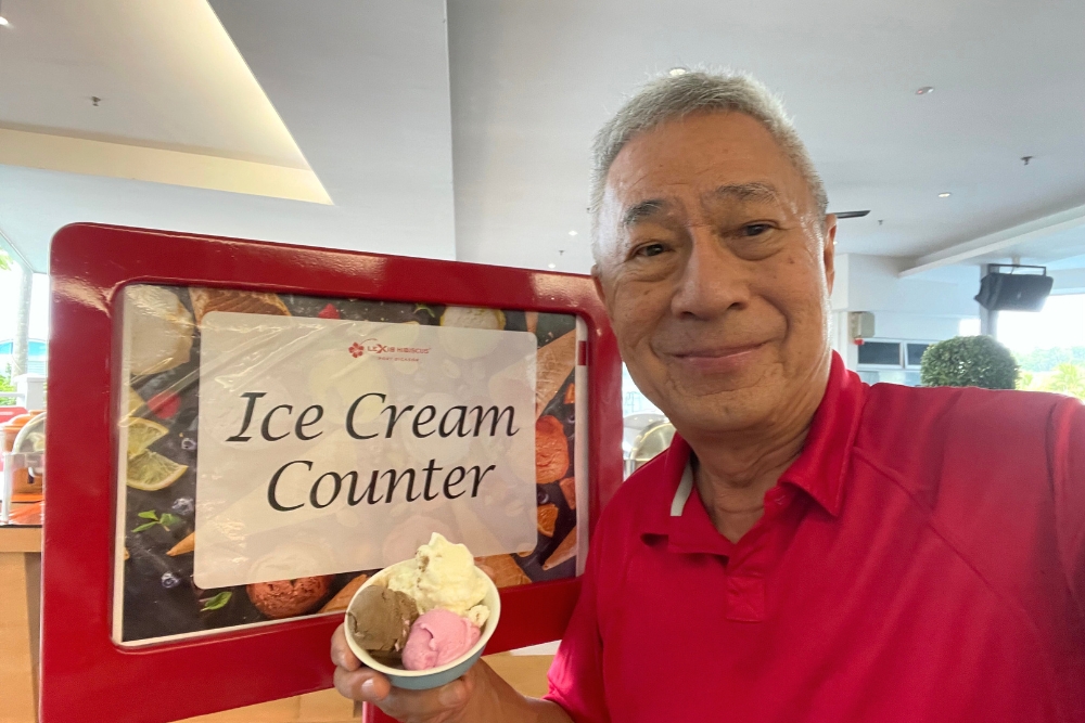 Port Dickson: A Budget Dream Beach Escape With Villas Over The Ocean, Just 4 Hours From Singapore - Jeffrey was very pleased with having ice cream for breakfast.