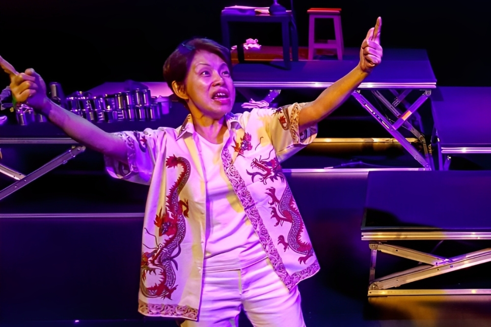 Ageless Theatre: The Senior-Only Drama Troupe Pursuing Their Passion For Acting - Debbie acts as the Kitchen God.