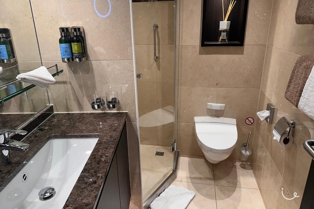 Cruising Down the Danube: Exploring Eastern Europe Through A River Cruise - The spacious toilet in the room with a marble countertop and L’Occitane products.