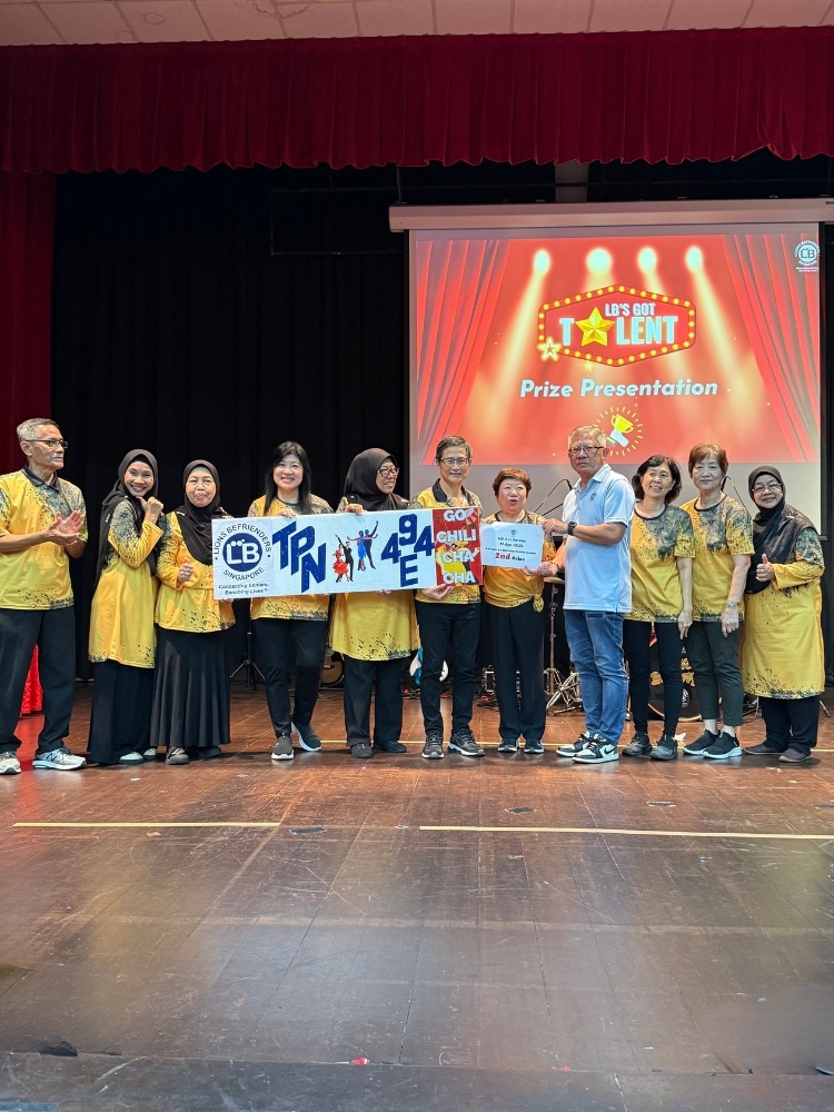 Never Too Old To Drum: The Tampines Seniors Keeping Mind And Body Active - Golden Drum claiming their prize at Lions Befrienders’ prize presentation