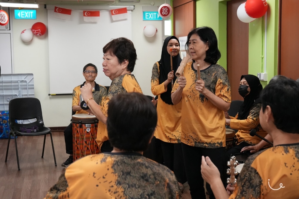 Never Too Old To Drum: The Tampines Seniors Keeping Mind And Body Active - Lim Sok Hoon (centre right) showing off her dance moves with other members of the group