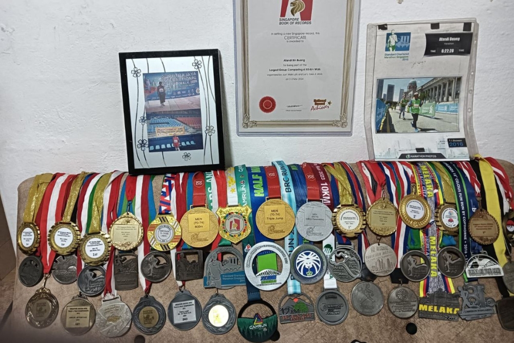 Running Strong at 80: How This Senior Runner Jogs 80km Weekly While Helping Others - Medals