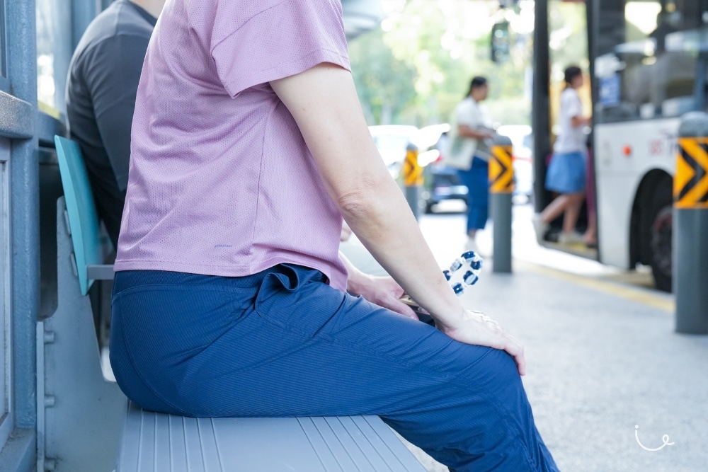 Adult Diapers For Travel, Concerts, And Long Queues: One Writer's Honest Review - Wearing Adult Diapers while seating down