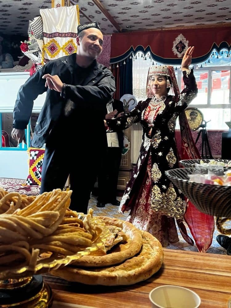 Journey Through Xinjiang: Exploring The Silk Road’s Revival, Ancient Cities, and China’s Stunning Landscapes - At the home of a Turkic family