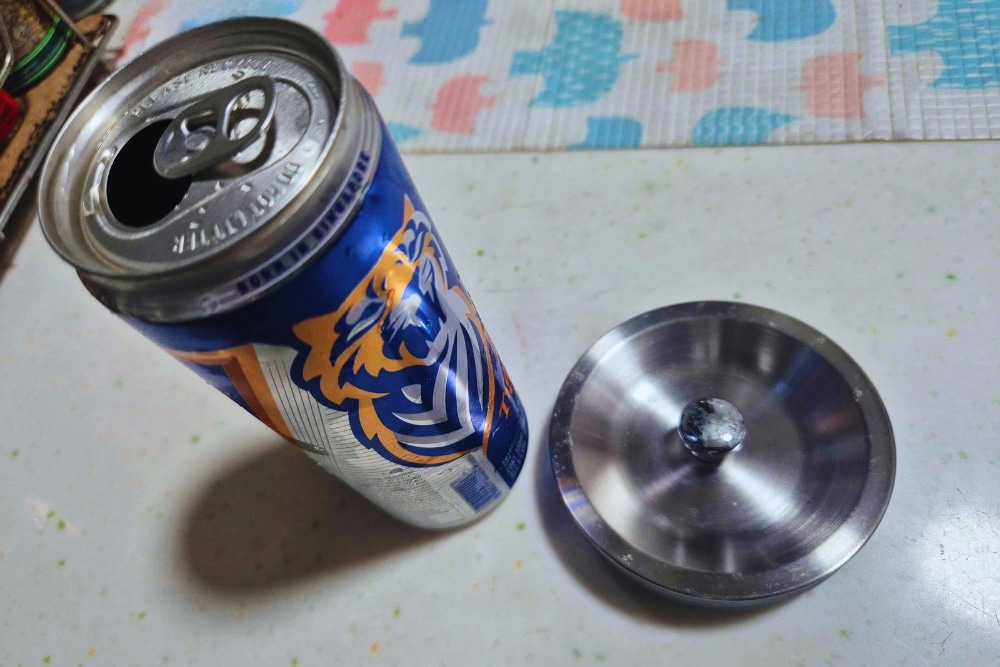 Leftover Beer: How To Turn It Into Homemade Skincare Products And Cleaning Agents - A rust-free sink drain cover after soaking and cleaning it with beer.