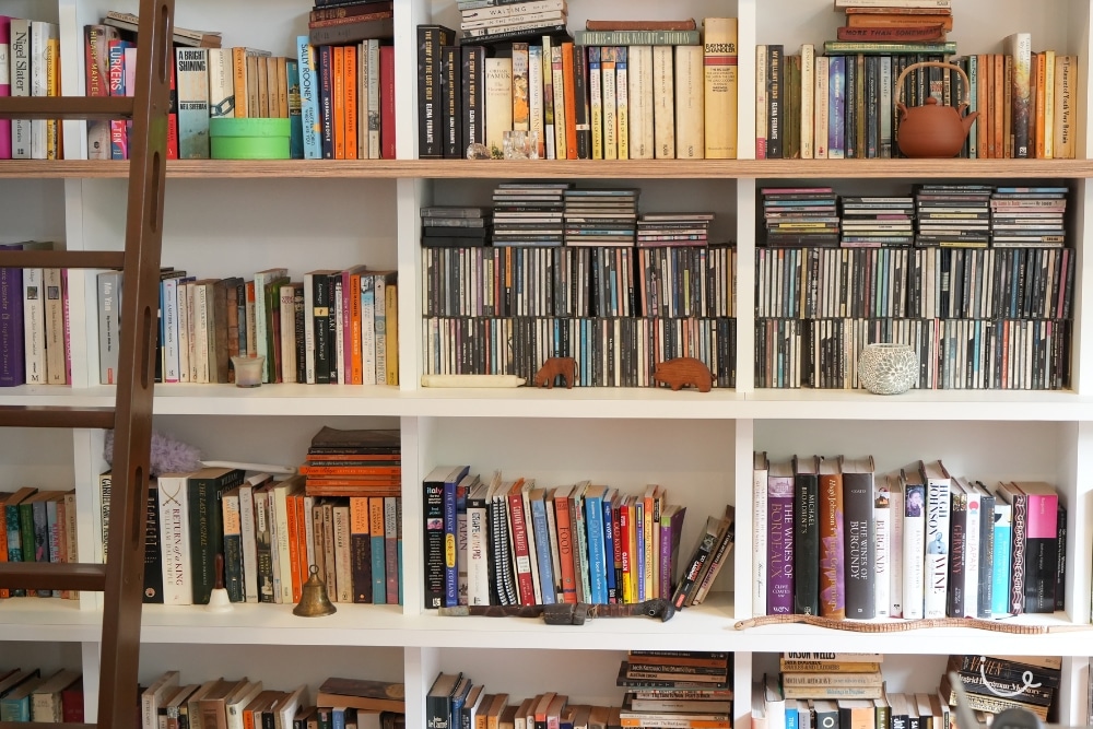 Downsizing Later In Life: My Journey On Letting Go and Moving On -Book and CD shelf